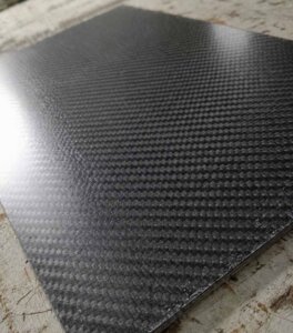 "precision cnc carbon fiber sheet cutting"