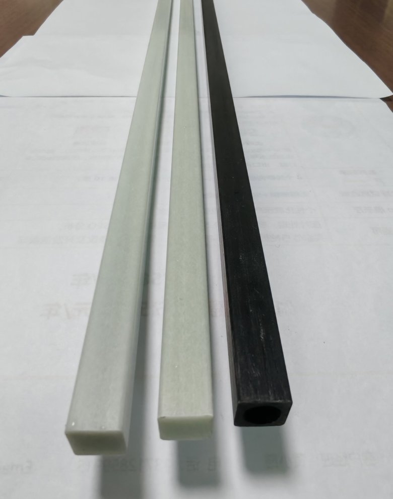 alt="carbon fiber square tube in aerospace robotic joint application"
