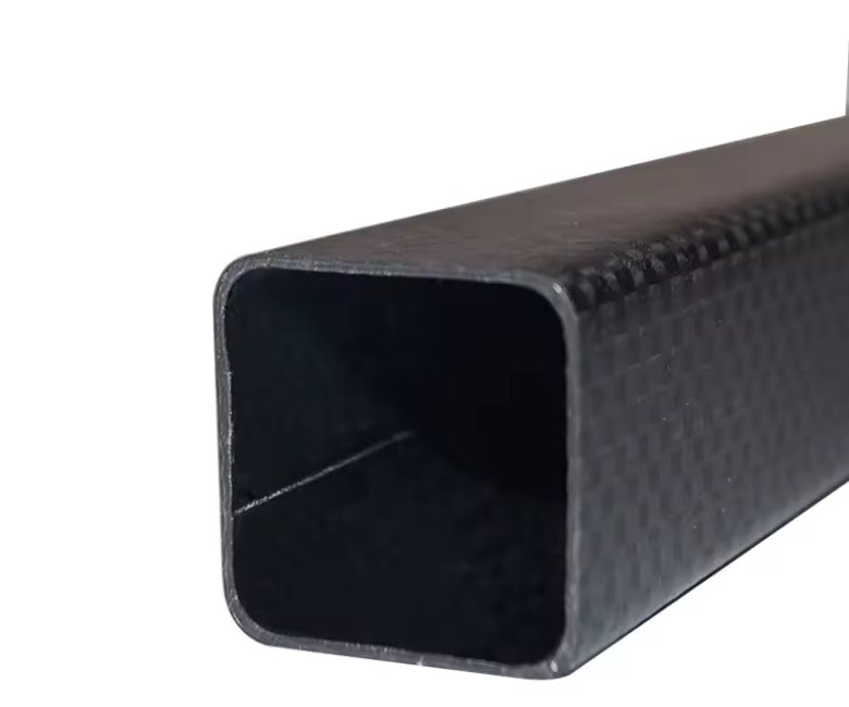 "Close-up of woven carbon fiber fabric showing its intricate pattern."