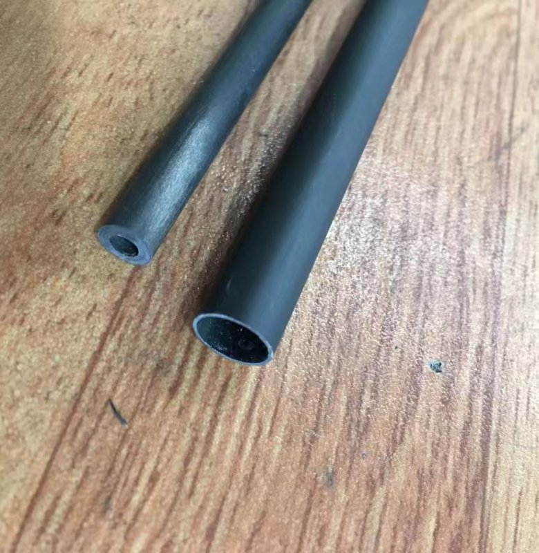 alt="custom carbon fiber tube integrated into client’s mechanical assembly"